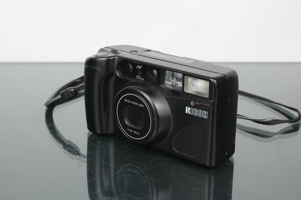 Ricoh Shotmaster Zoom 70 - Dutch|Thrift